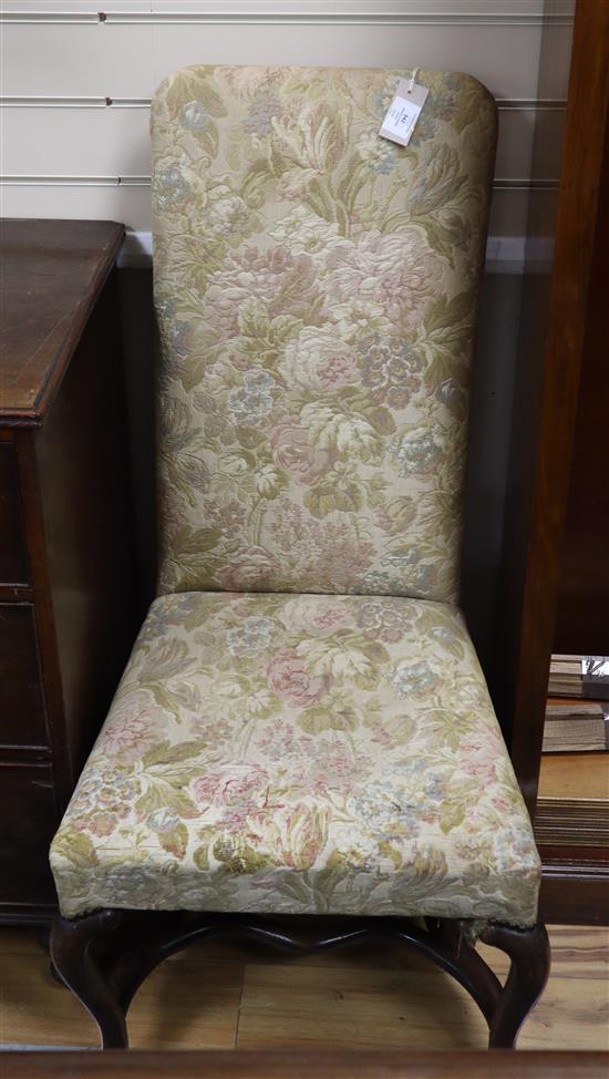 An 18th century and later upholstered high back chair